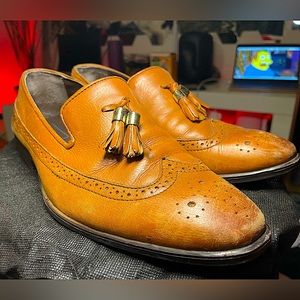 ASOS DESIGN brogue loafers in tan leather with gold tassel detail